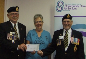 L-R Ted Taylor, Past Zone Commander of F3 and President of Legion Branch 78 presents a cheque for $1500.00 to Barbara Lyons, President of PEC Community Care for Seniors Association, and looking on is Mike Slatter, Branch 78 and Zone Officer and Member of 
